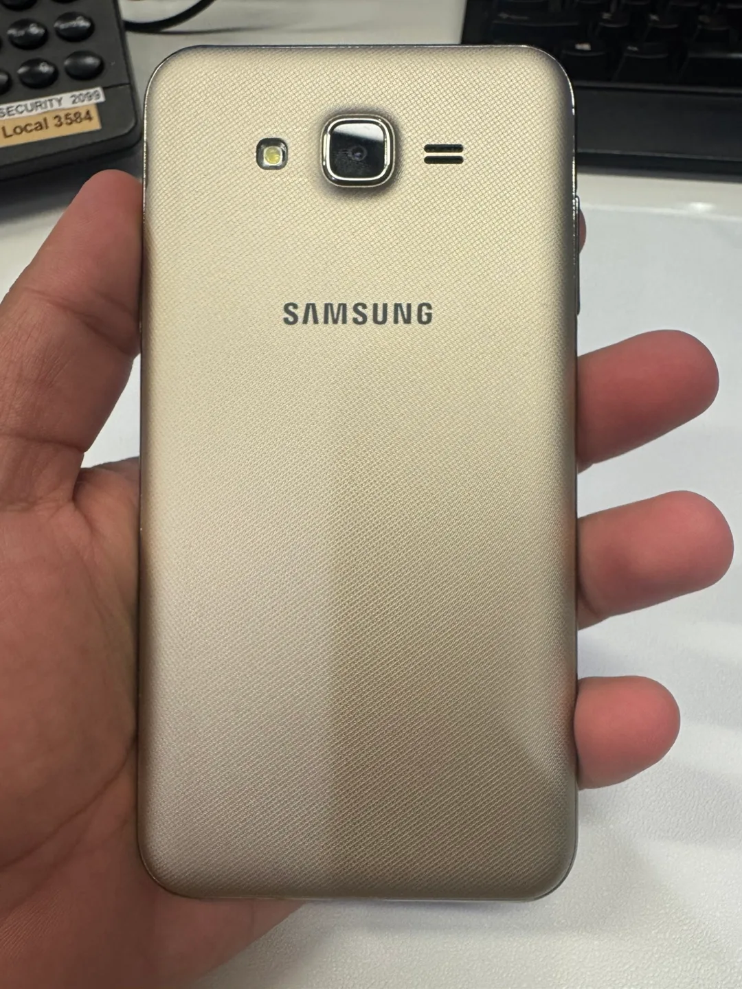Samsung Galaxy J7 Gold with Case thumbnail