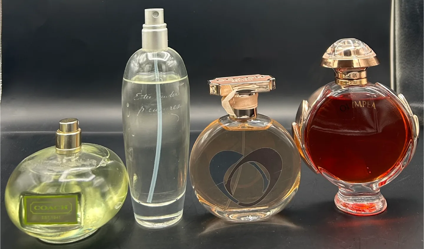 Mixed Perfume Lot: Coach, Estee Lauder, and Paco Rabbane thumbnail