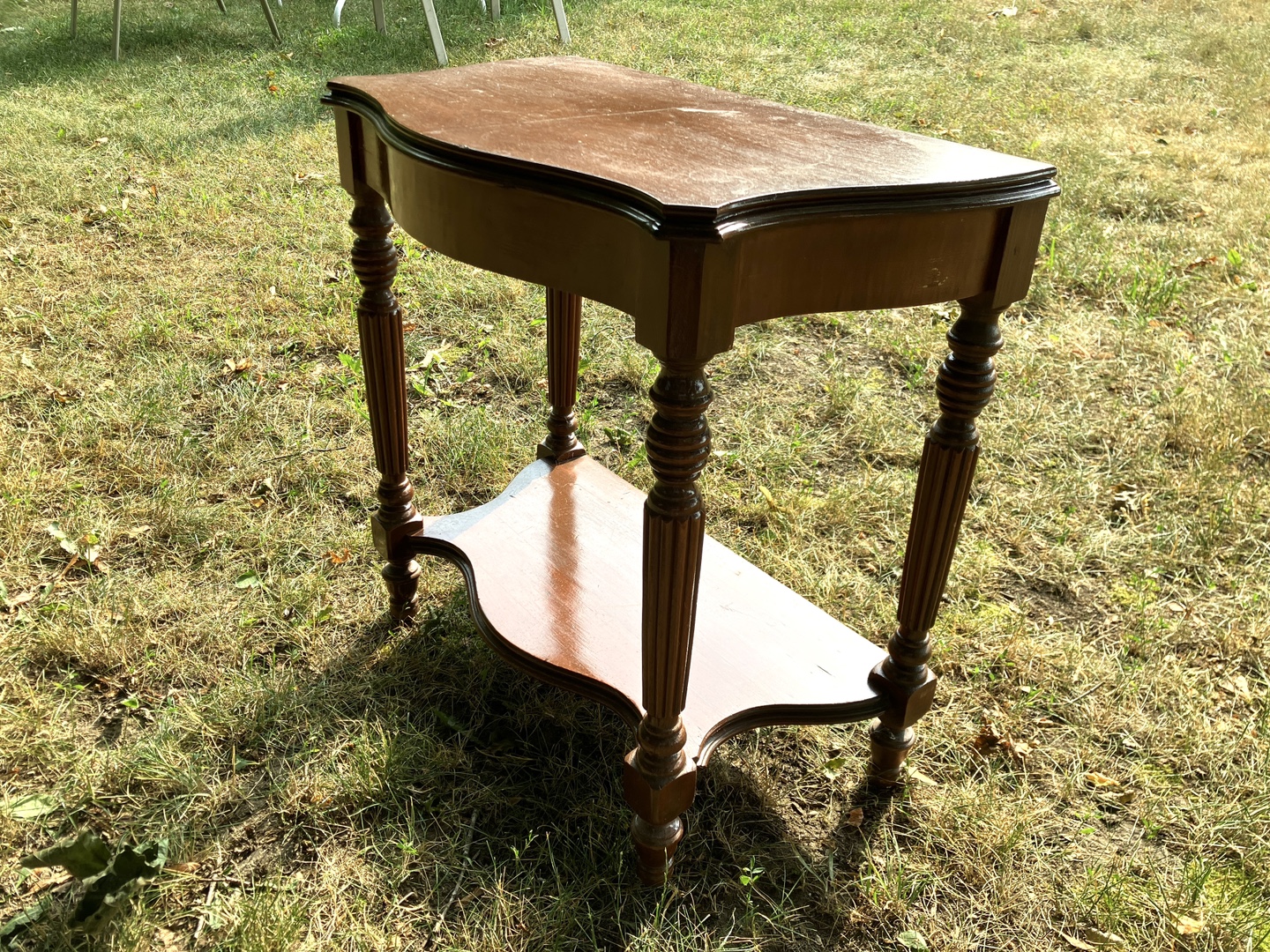 Antique Walnut demilune table.