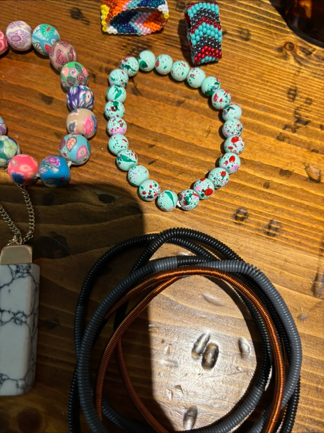 Assorted beaded bracelets and necklace image indicator(2)