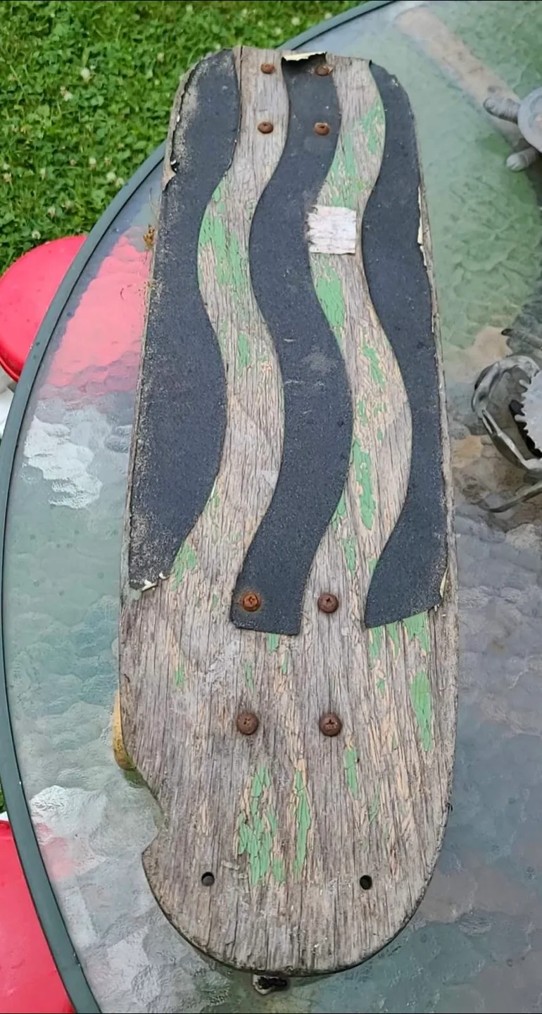 Vintage Skateboard with Skeleton Graphic image indicator(2)