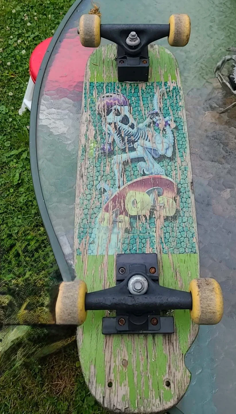 Vintage Skateboard with Skeleton Graphic thumbnail