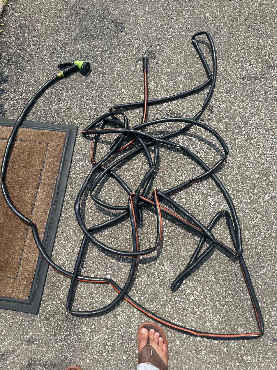 Garden Hose with Spray Nozzle thumbnail