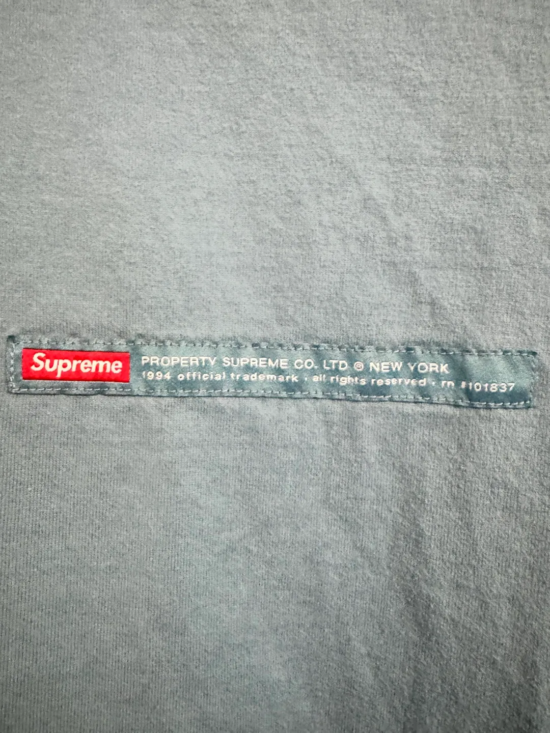 Supreme Property Label Short Sleeve Top ‘Light Slate’ (XL mens) image indicator(8)