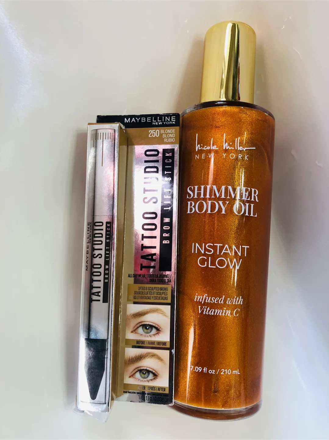 Nicole Miller Body Shimmer Oil & Maybelline Studio Eye Brow thumbnail