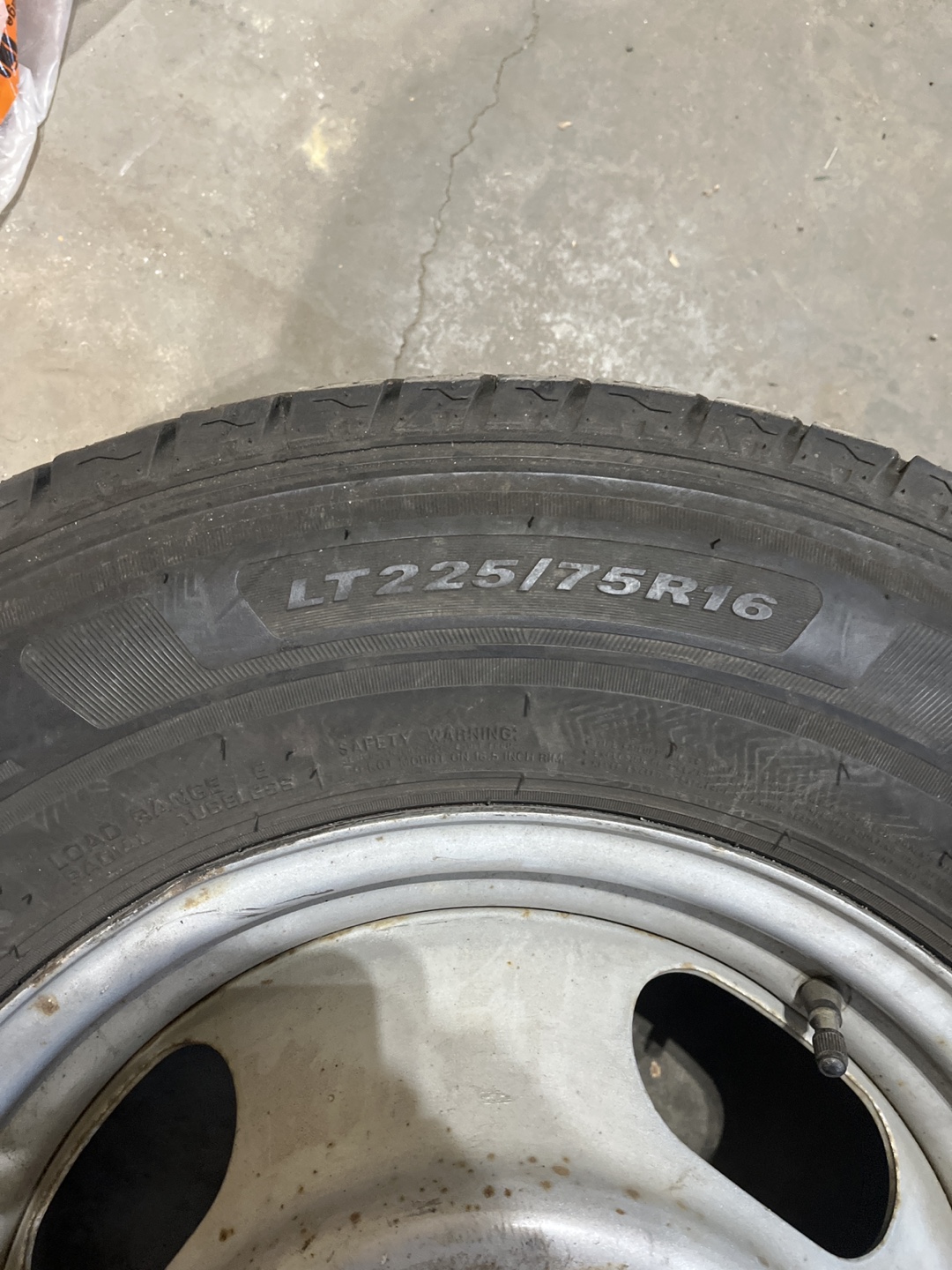 LT225/75R16 Tire with Rim - photo 2