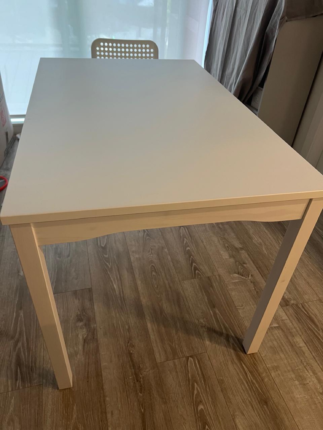 White dining table with four chairs