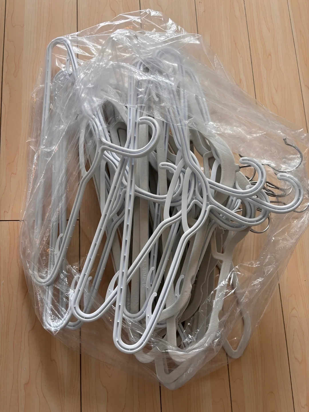 Variety of White Clothes Hangers - Lot of 27 thumbnail