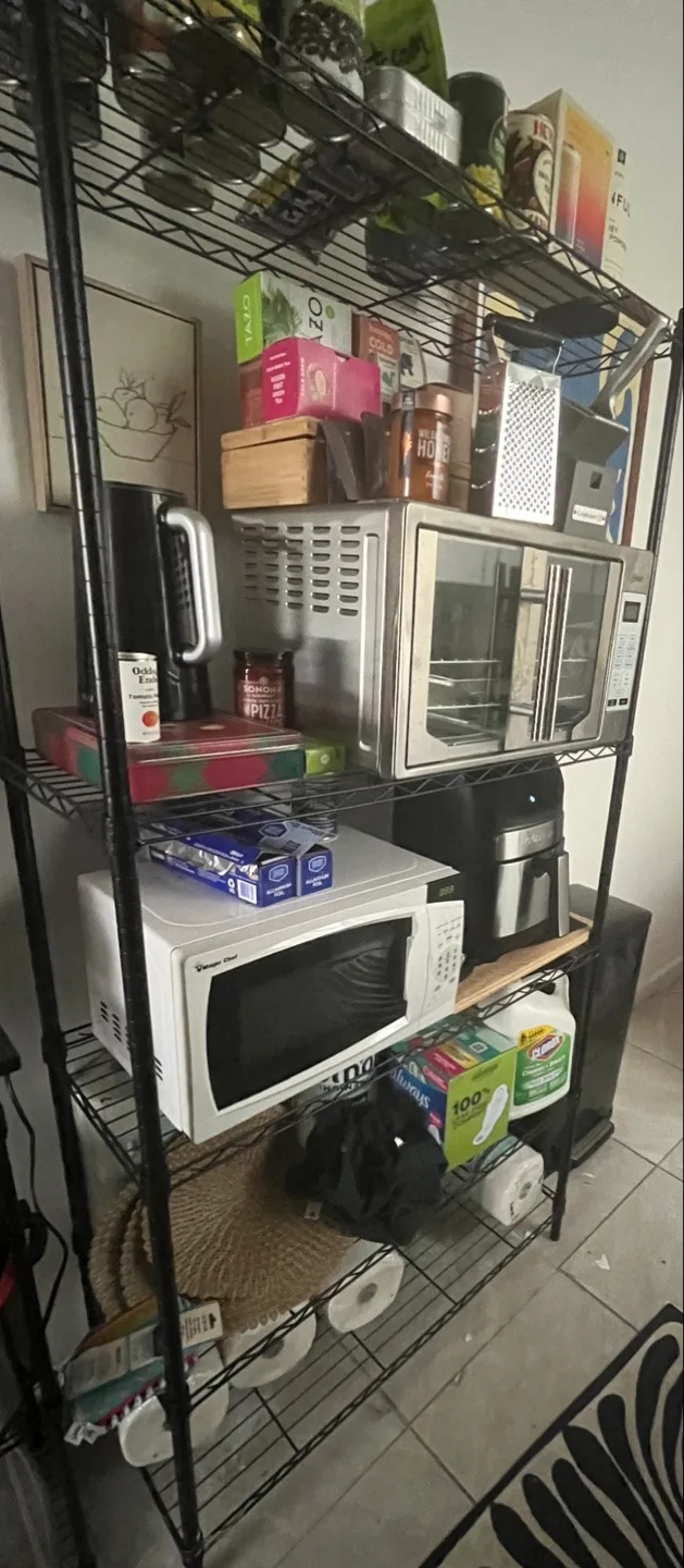 Black metal shelving unit thumbnail