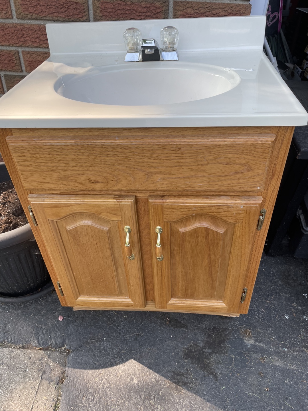 Bathroom cabinet with sink and taps