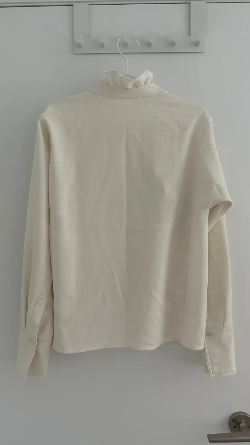 Ruffle Trim Button-Up Blouse - Cream image indicator(4)