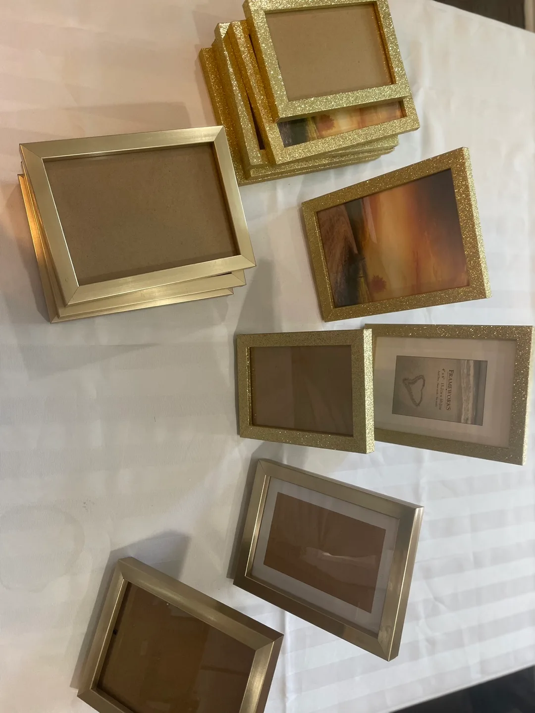 Assorted gold photo frames thumbnail