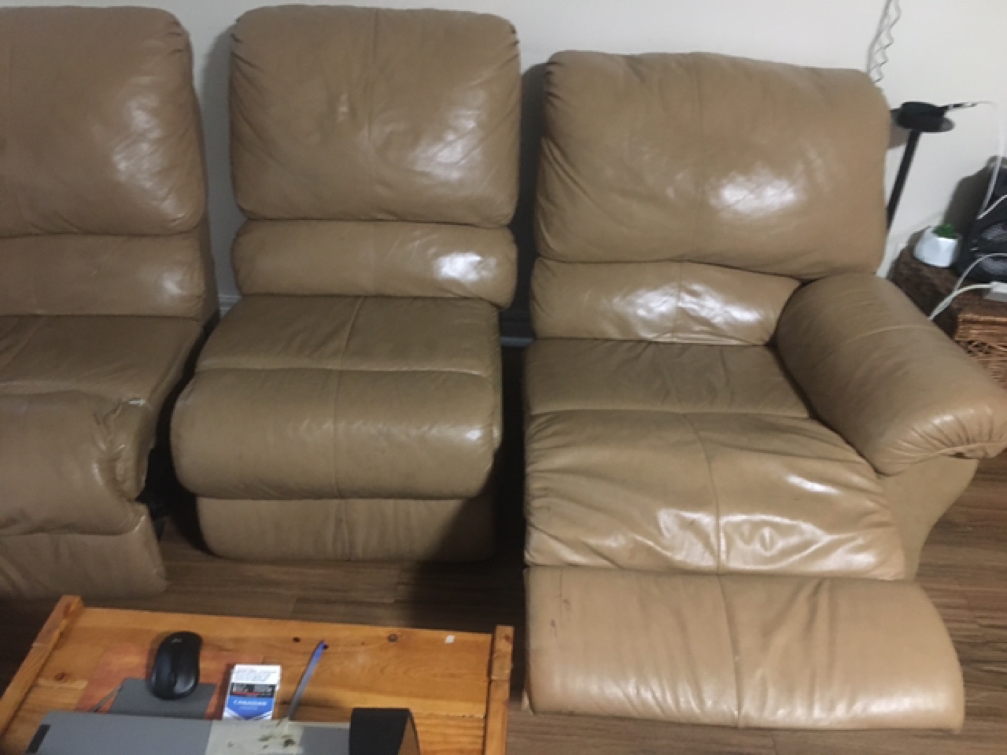 Leather three piece reclining couch