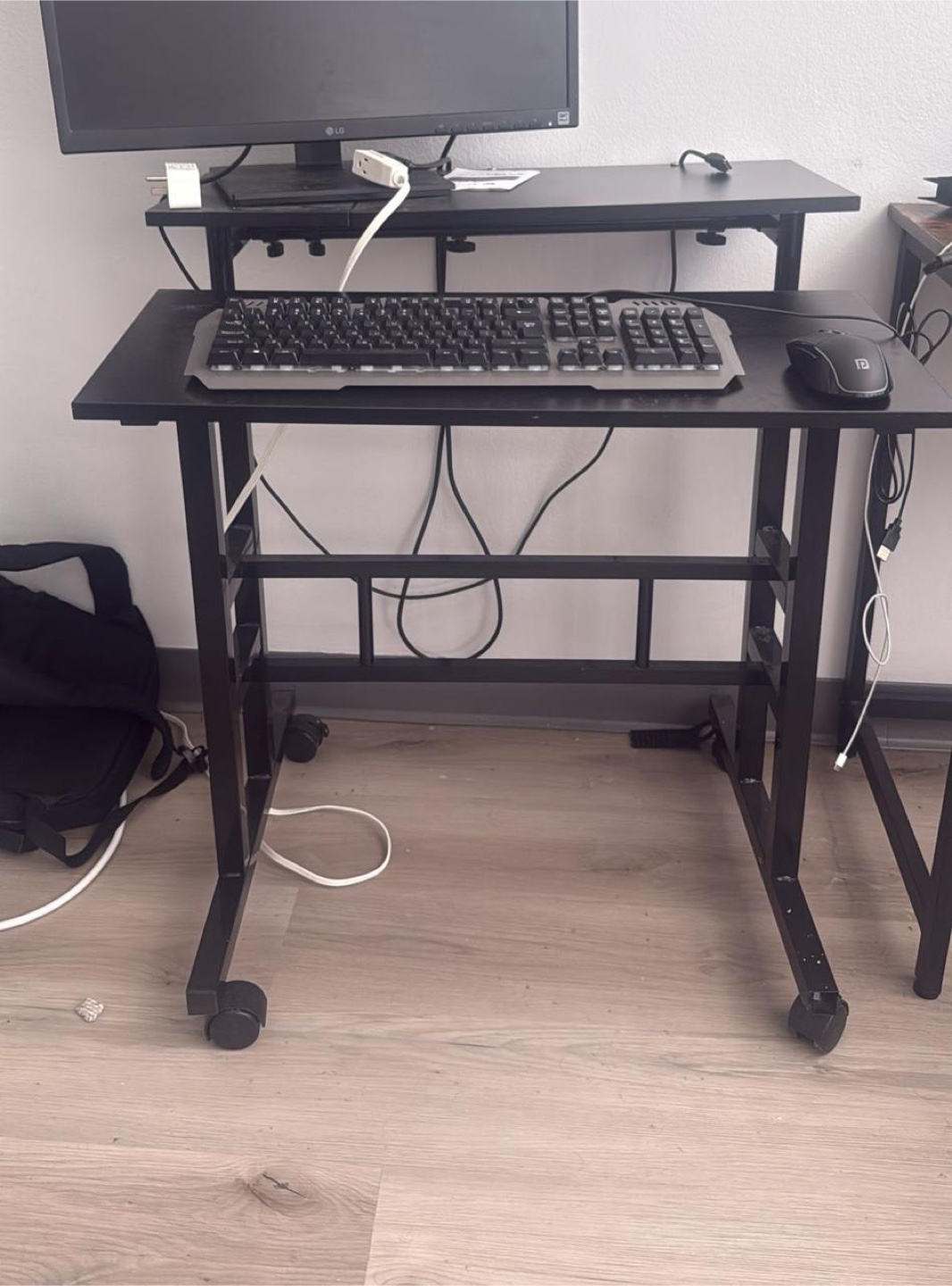 Black Rolling Computer Desk ( Height and tilt adjustable)