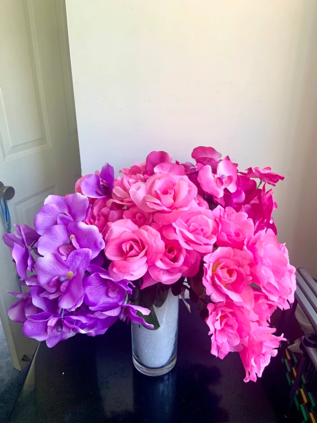 Beautiful artificial flowers with glass vase thumbnail