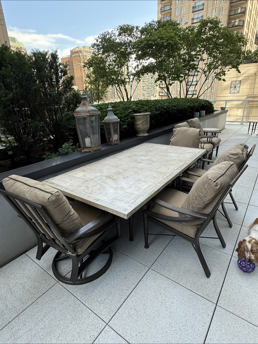 Woodard outdoor travertine dinning table and 6 chairs