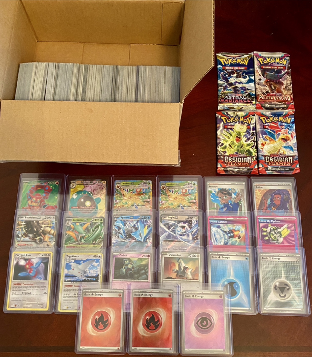 Over 800 Pokemon Cards & 4 Sealed Booster Packs - Negotiable