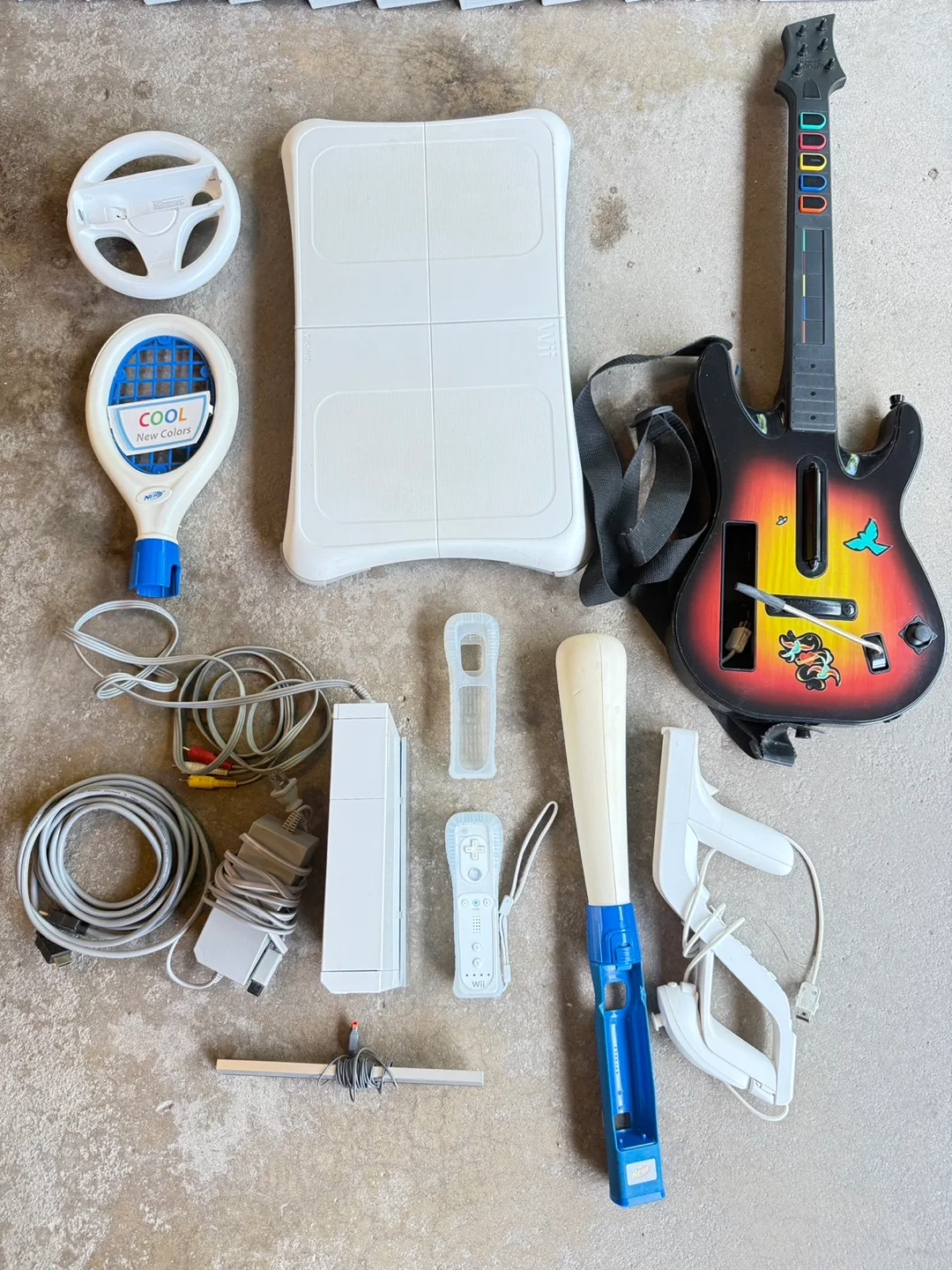 Wii Nintendo set heavily accessorised with disks. thumbnail
