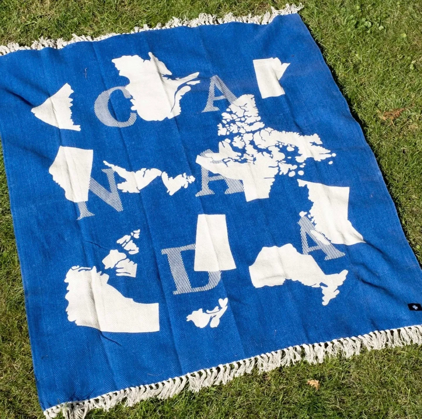 Brand new drake general store Canada Throw Blanket thumbnail