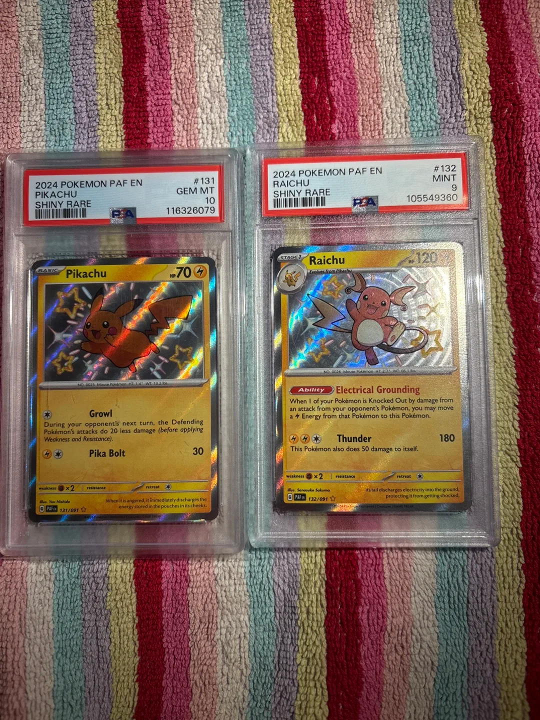 Pikachu #131 PSA10 + Raichu #132 PSA9 Paldean Fates (very clean) thumbnail