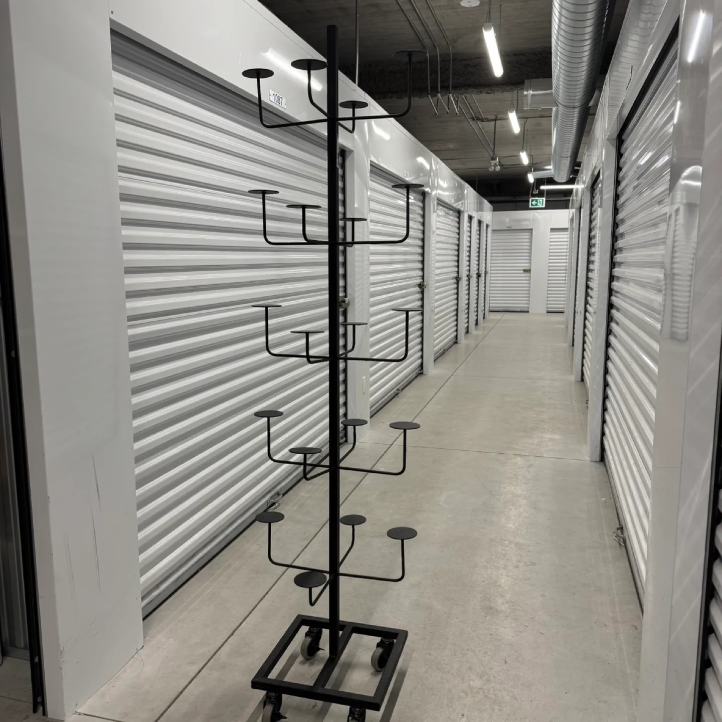 Black Metal Hat Display Stand on Wheels image indicator(3)