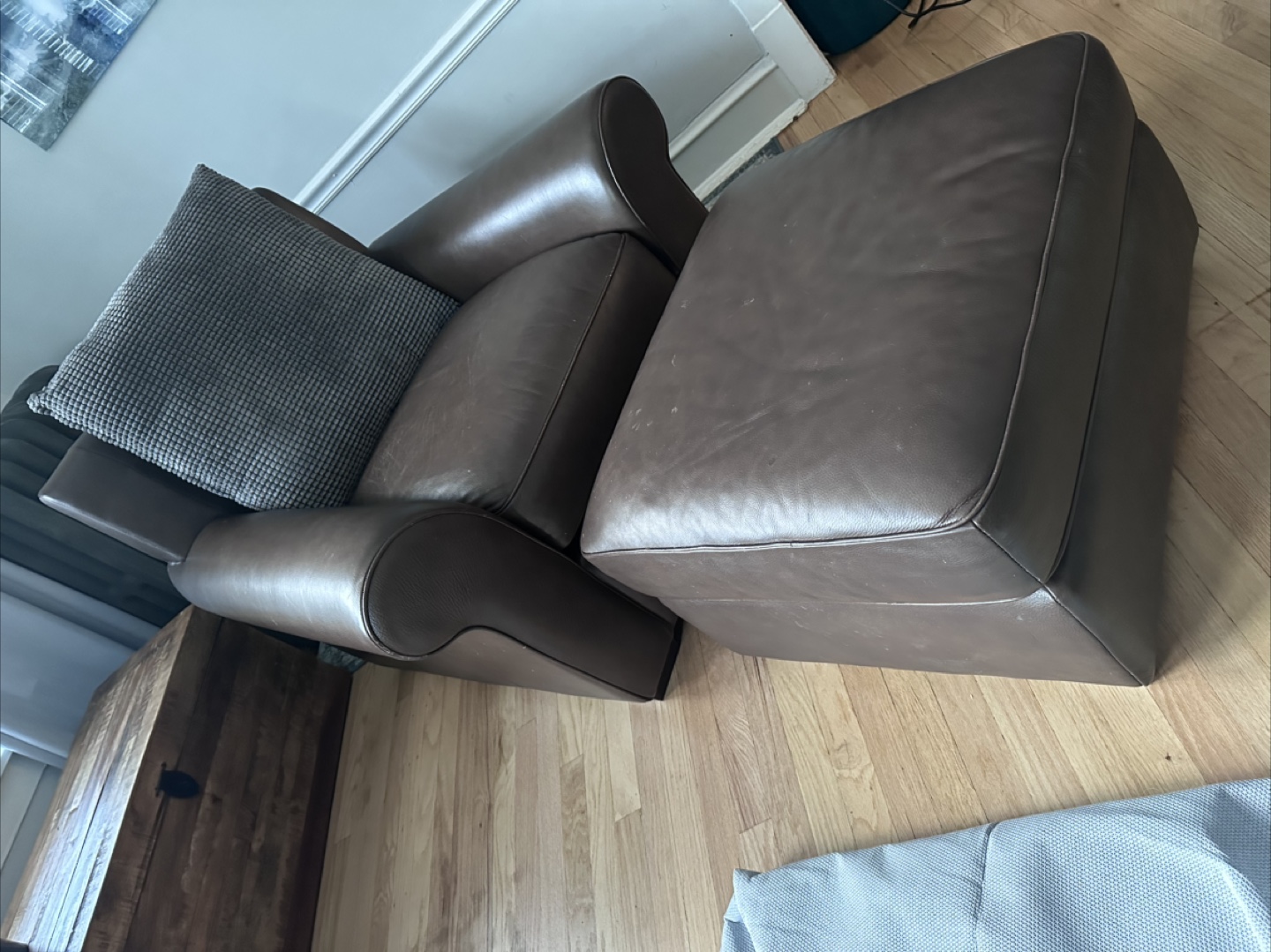 Brown Leather Armchair and Ottoman Set