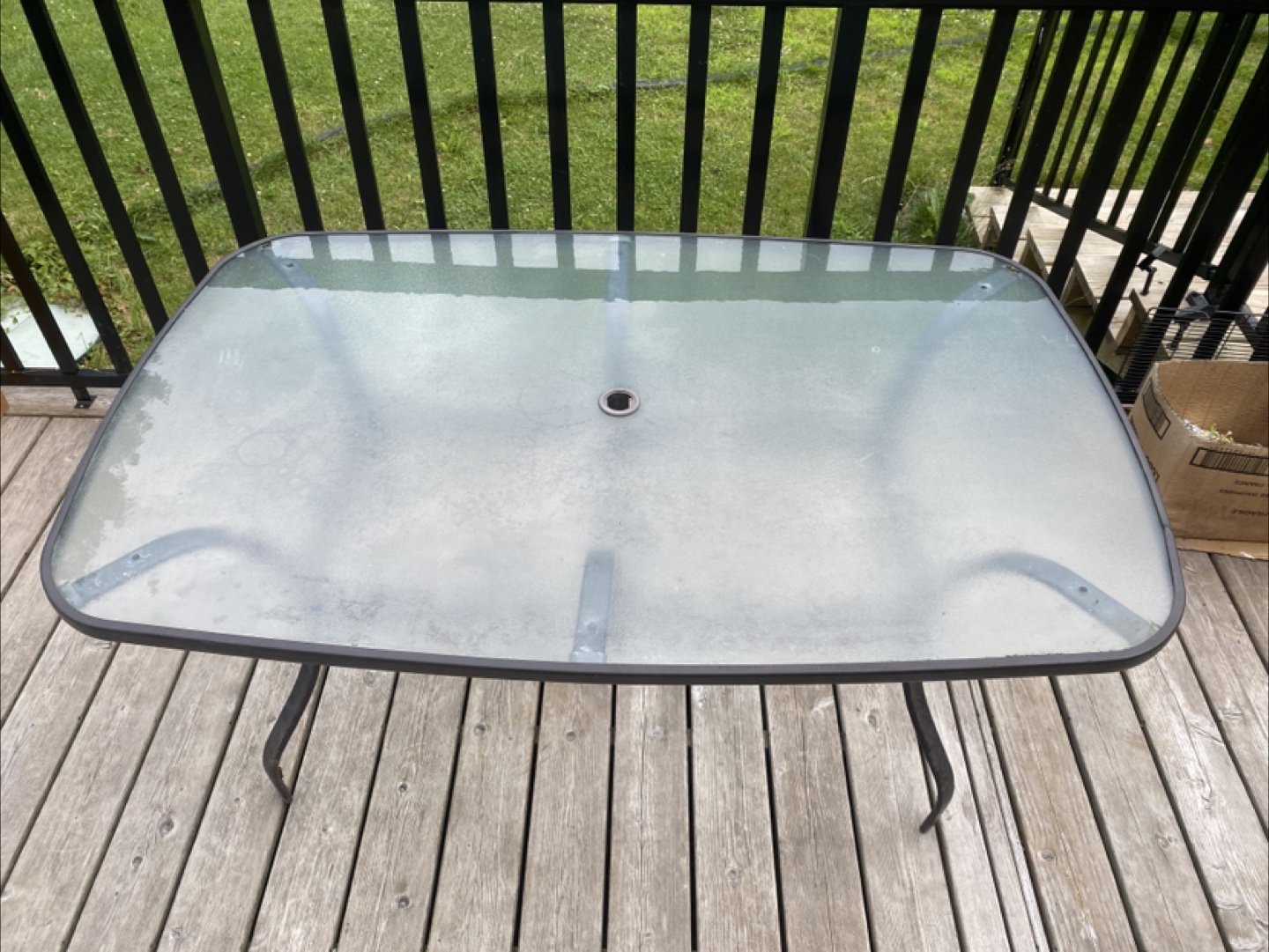 Glass Patio Table in Great Condition (CAN DELIVER)
