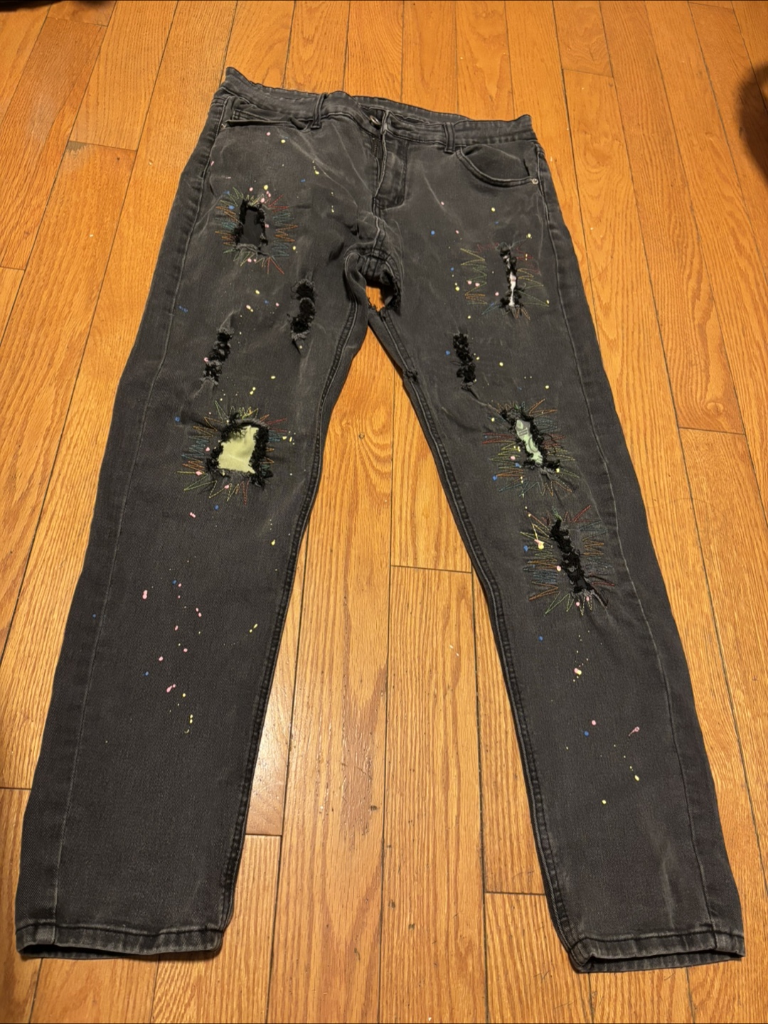 Distressed Black Jeans with Paint Splatter