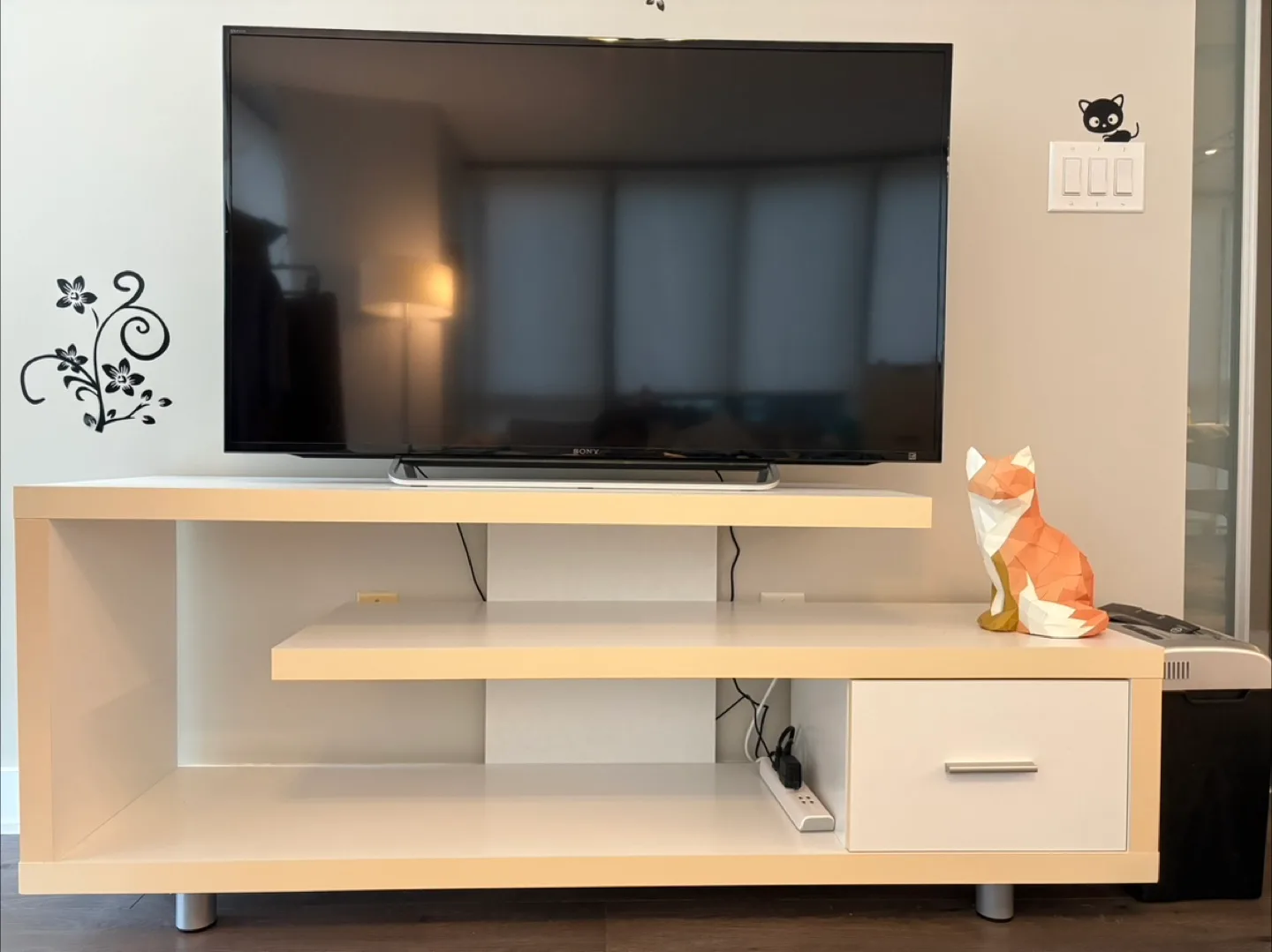 Sony TV on Modern TV Stand thumbnail