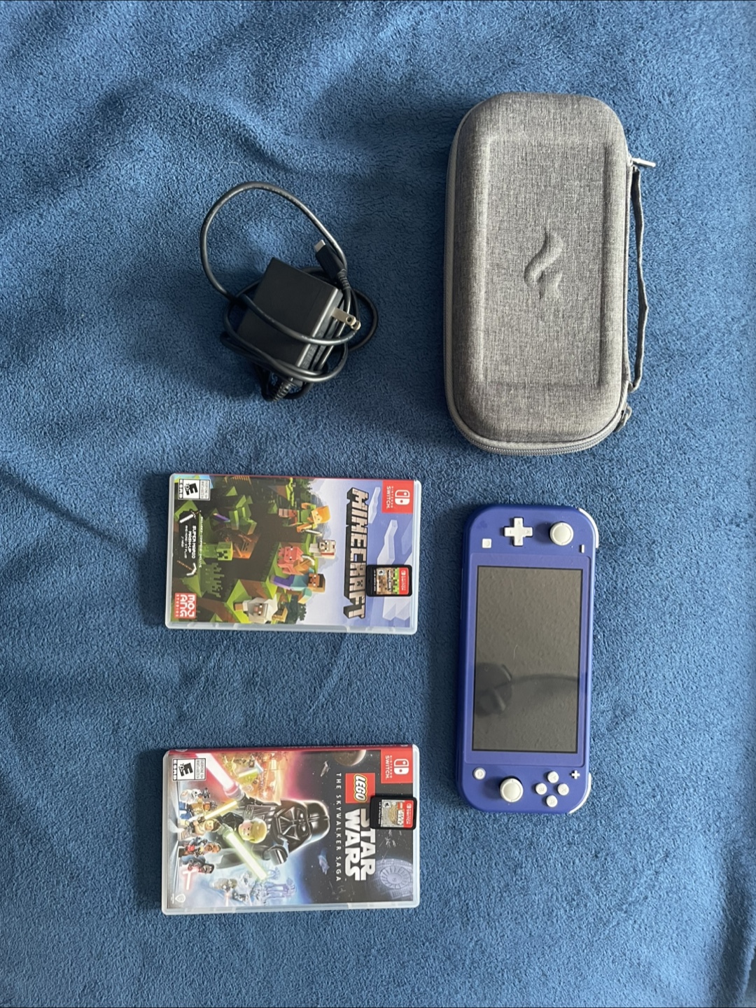 Nintendo Switch Lite (Blue) with Games & Case