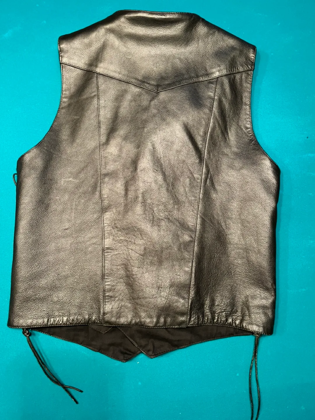 Lammle’s black leather vest image indicator(3)