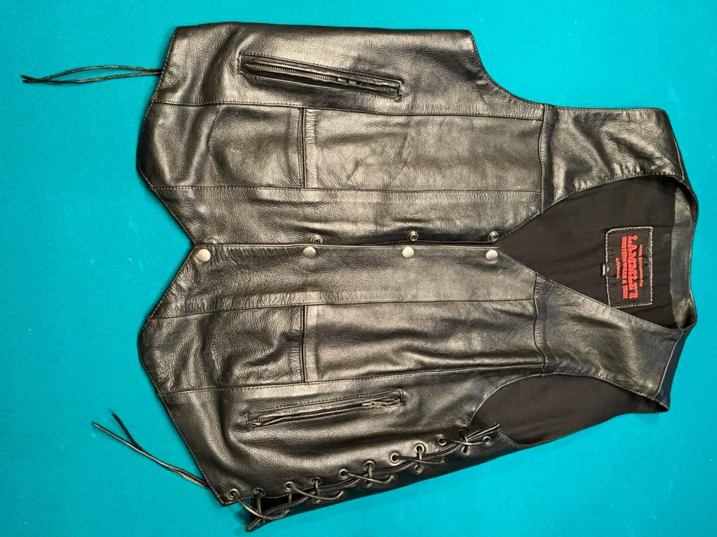 Lammle’s black leather vest image indicator(2)