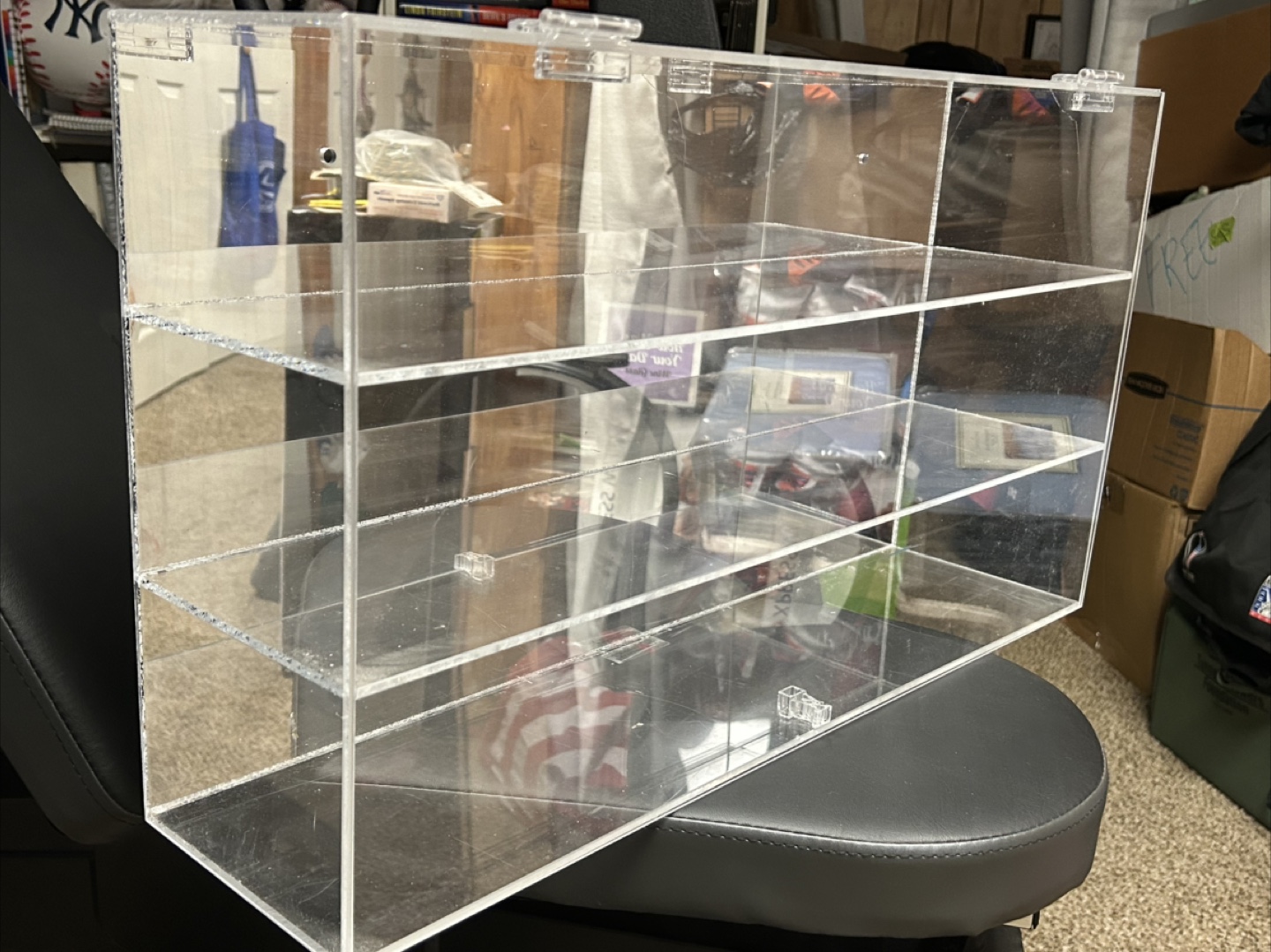 Plexiglass display unit.  Mirror back