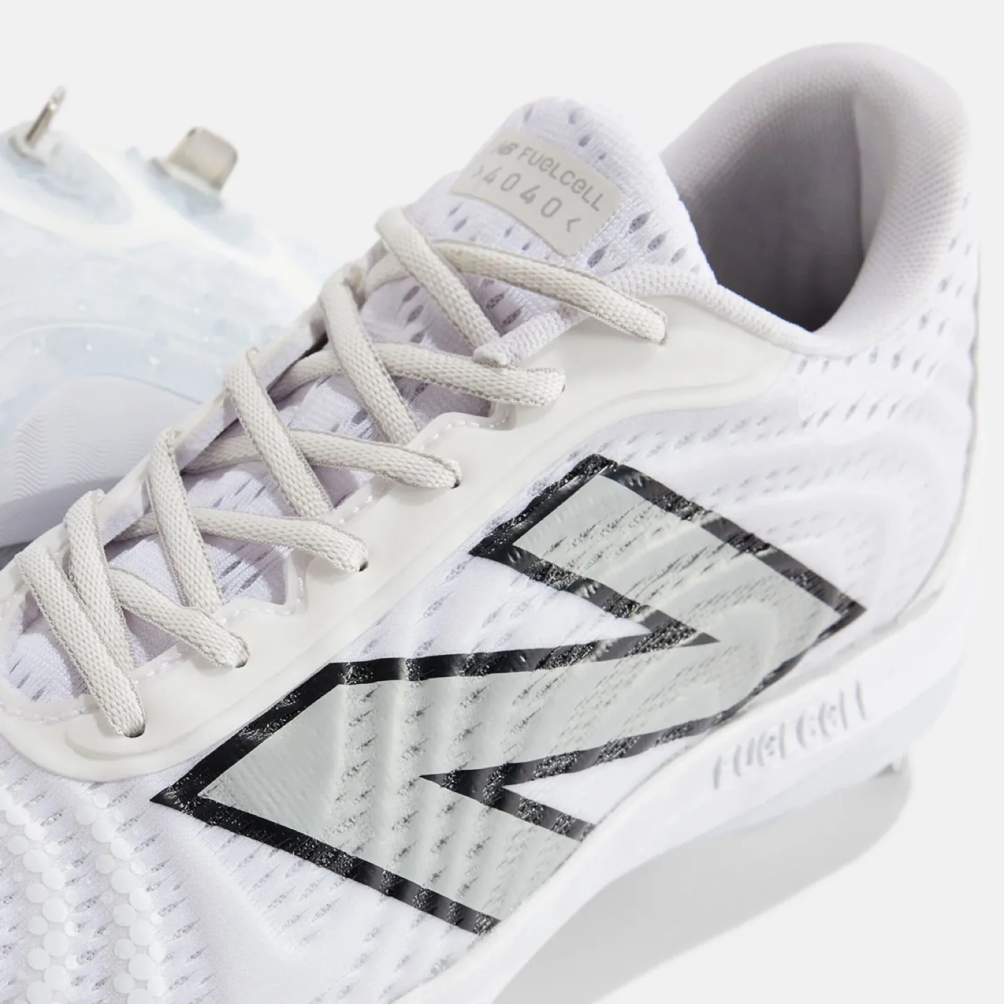 New Balance FuelCell 4040v7 Cleats - White image indicator(2)
