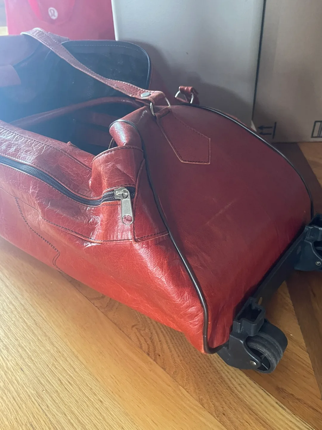 Reddish Brown Leather Rolling Duffle Bag thumbnail