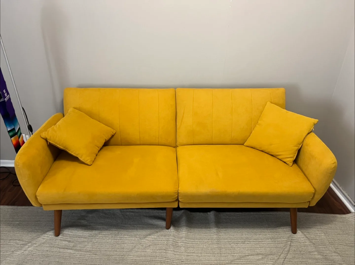 Yellow Futon Couch with Pillows thumbnail
