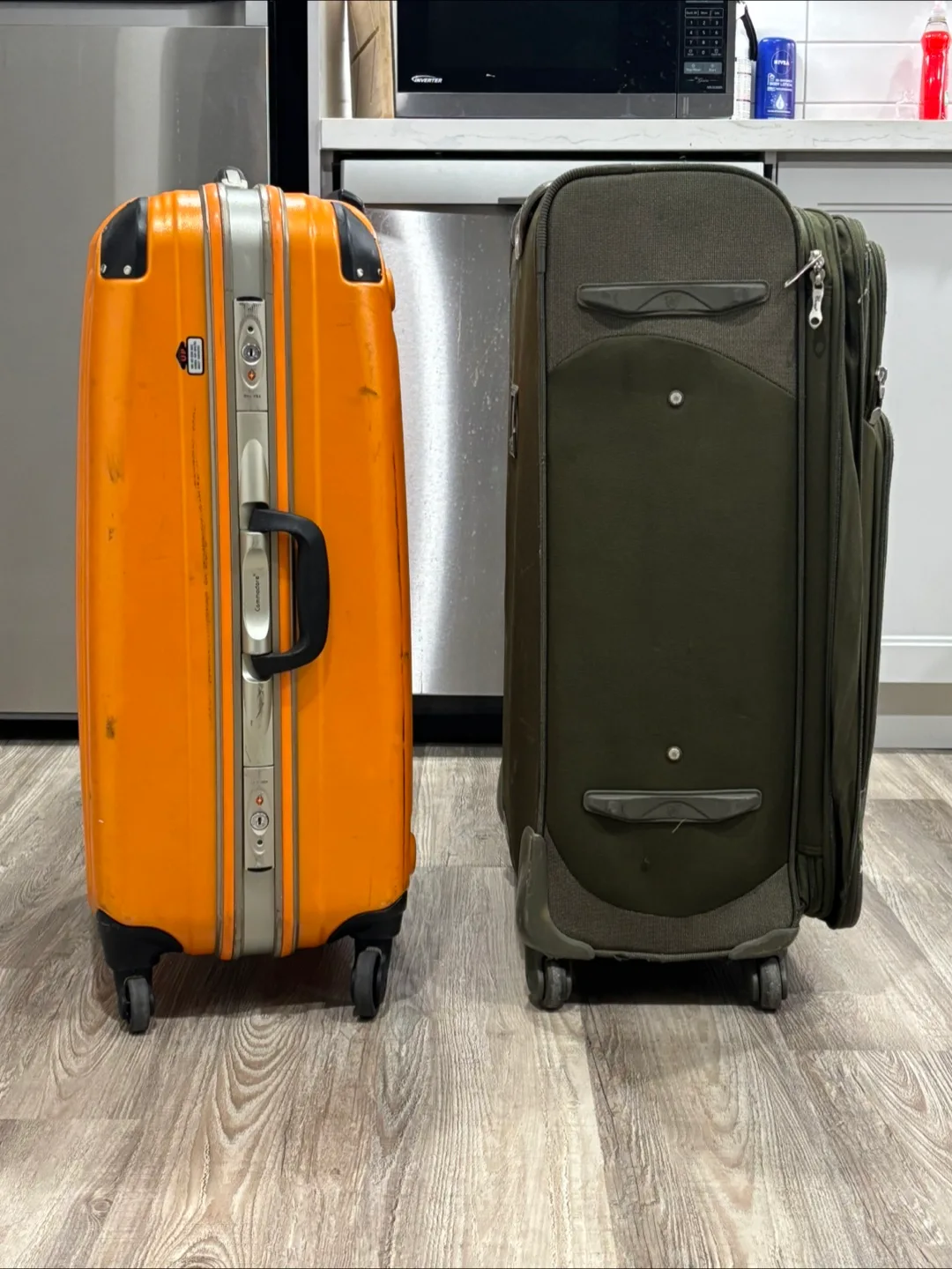 Two Used Suitcases - Orange & Green