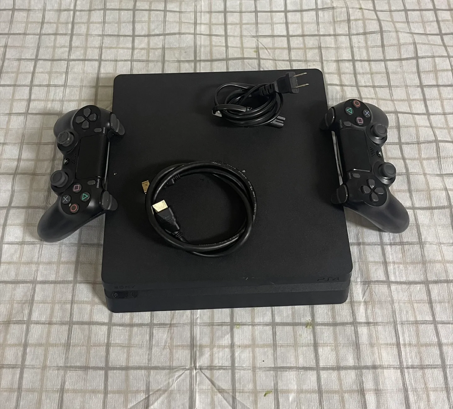 PS4 Slim 1TB + 2 Controllers – Good Condition – Local Pickup