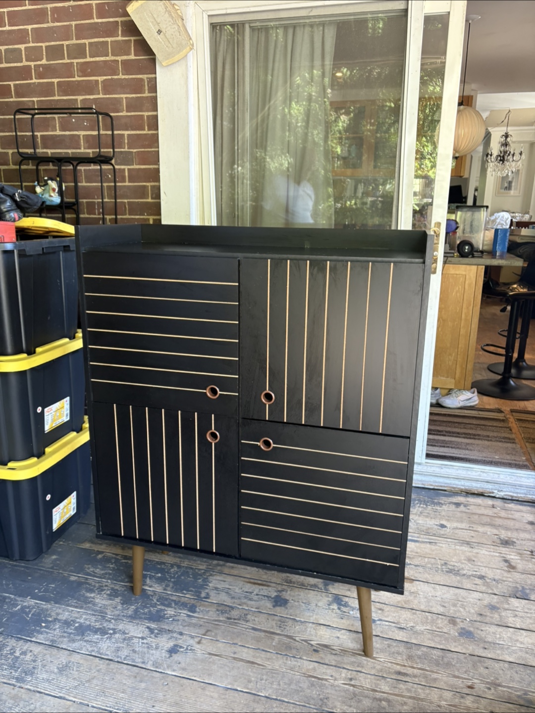 Black Cabinet with brown Accents