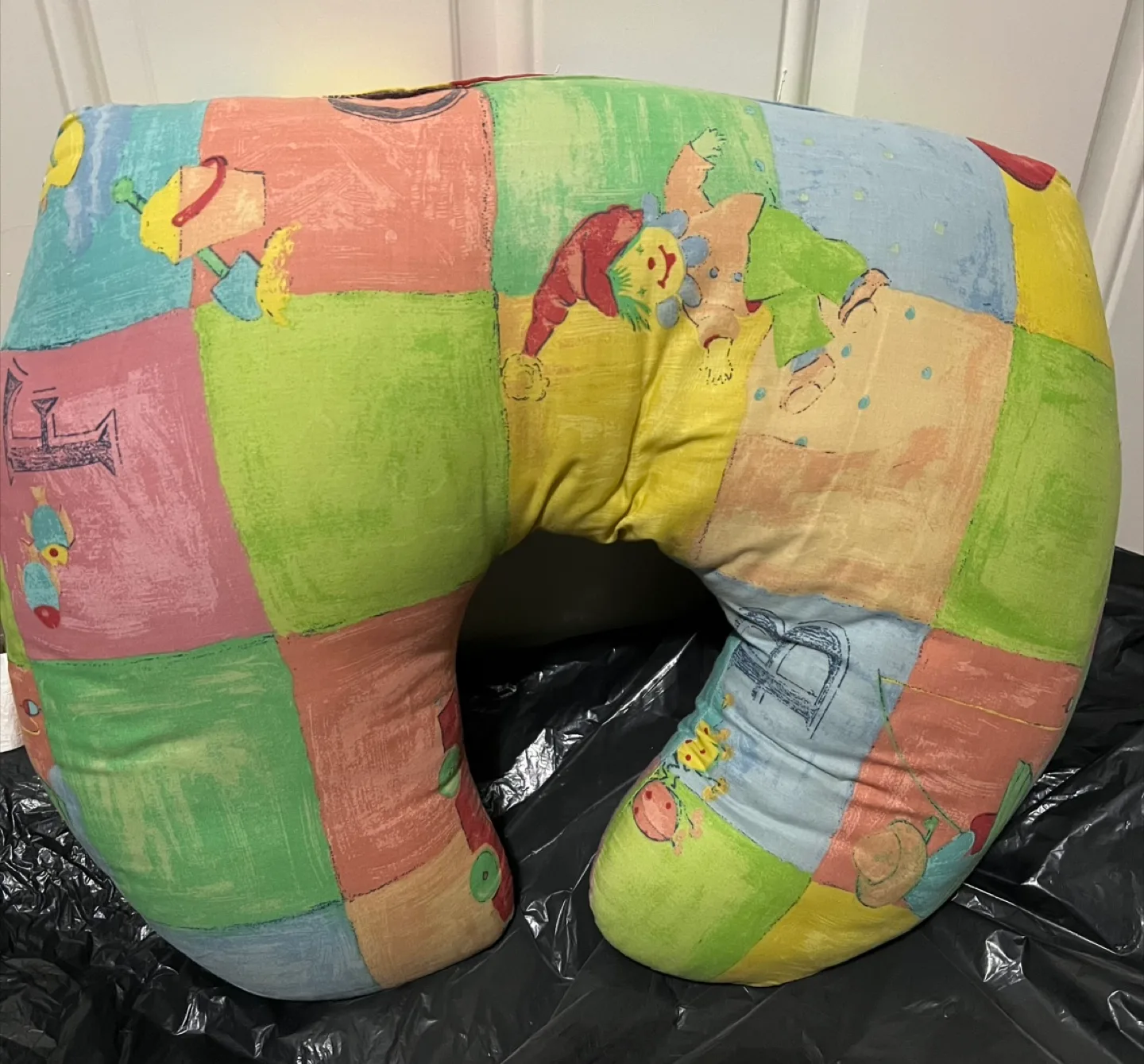 Jolly Jumper Nursing Pillow with Colorful Patchwork Design thumbnail