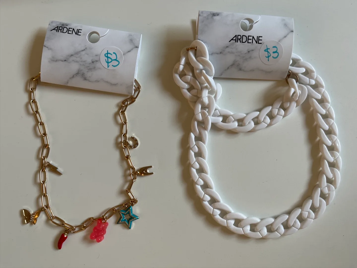 Ardene Necklaces - Gold Charm & White Chain thumbnail