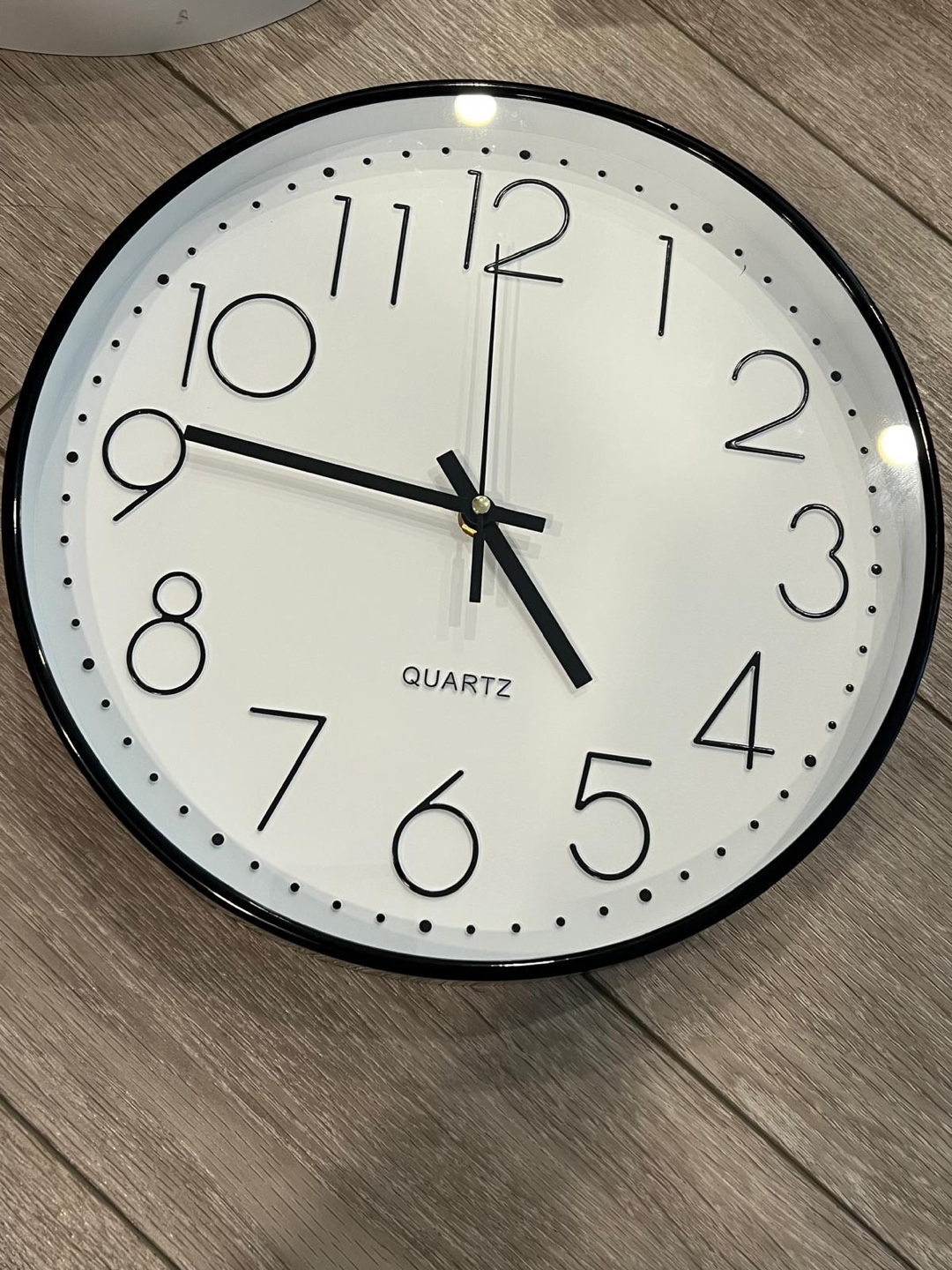 Three White Quartz Wall Clocks
