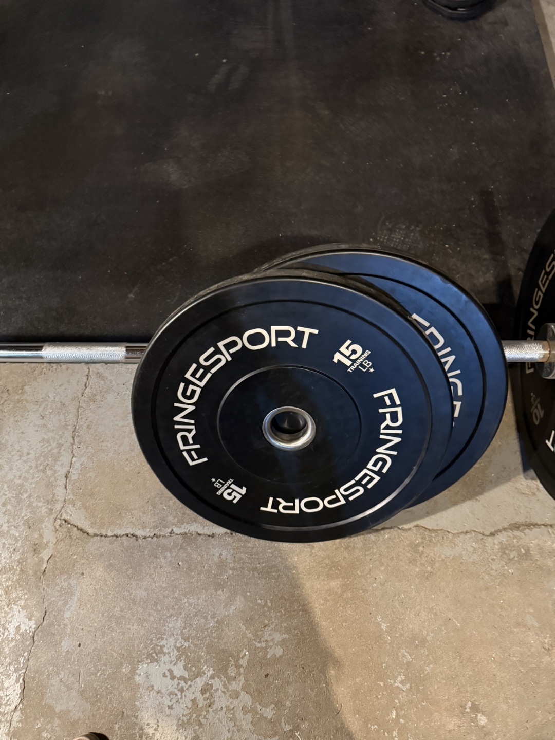 Olympic barbell with three sets of bumper plates - photo 3