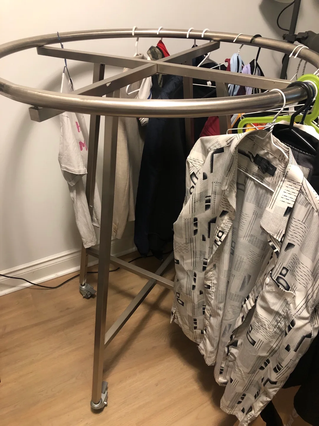 Round Clothing Rack with Wheels thumbnail