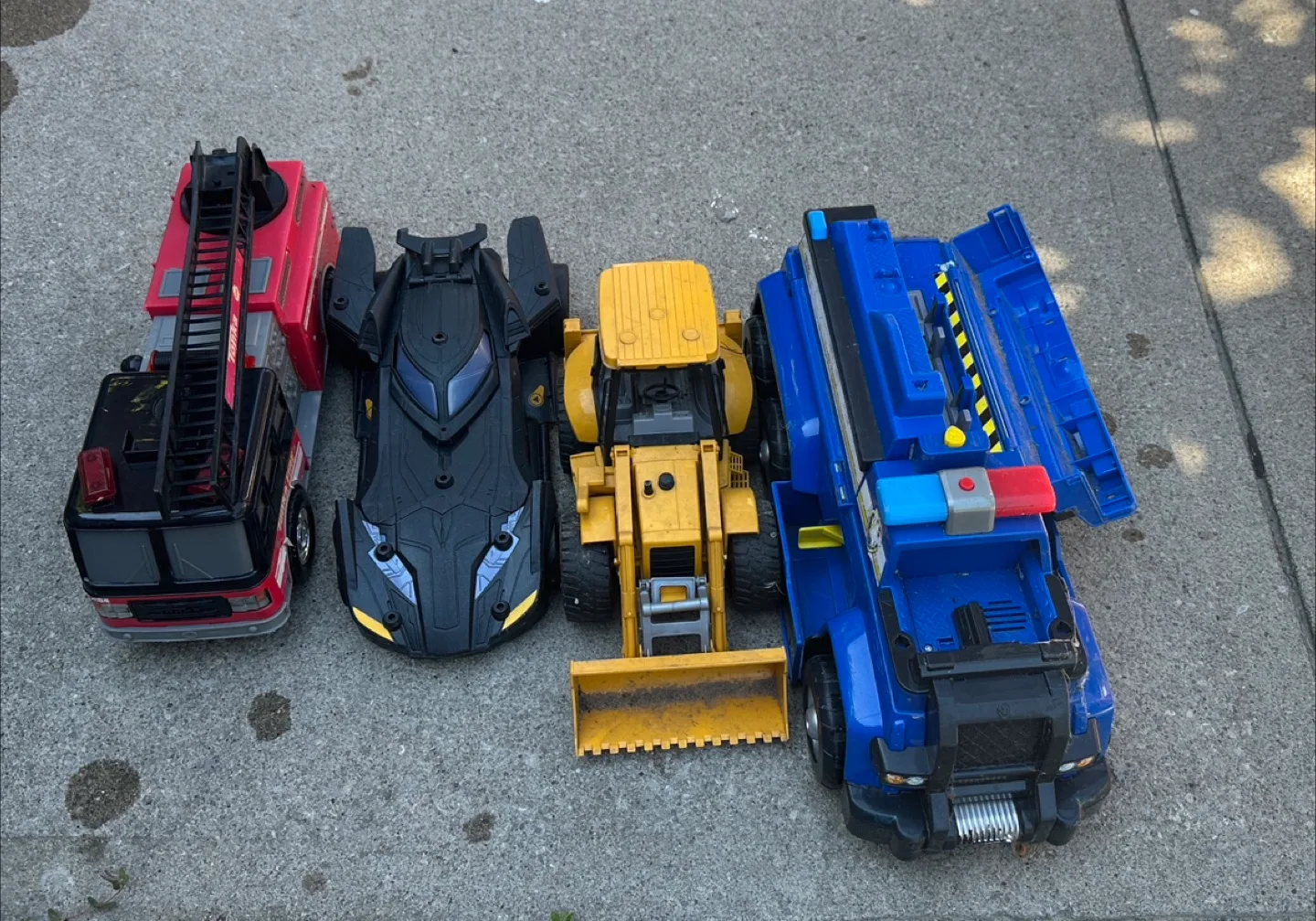 Toy Trucks: Firetruck, Batmobile, Loader, Police Truck thumbnail
