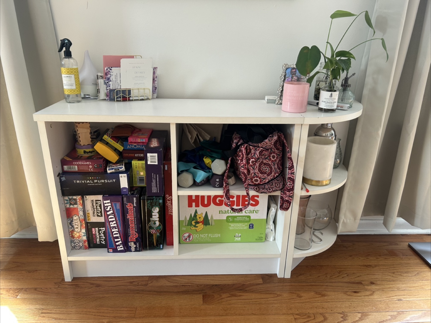 White wooden storage shelves