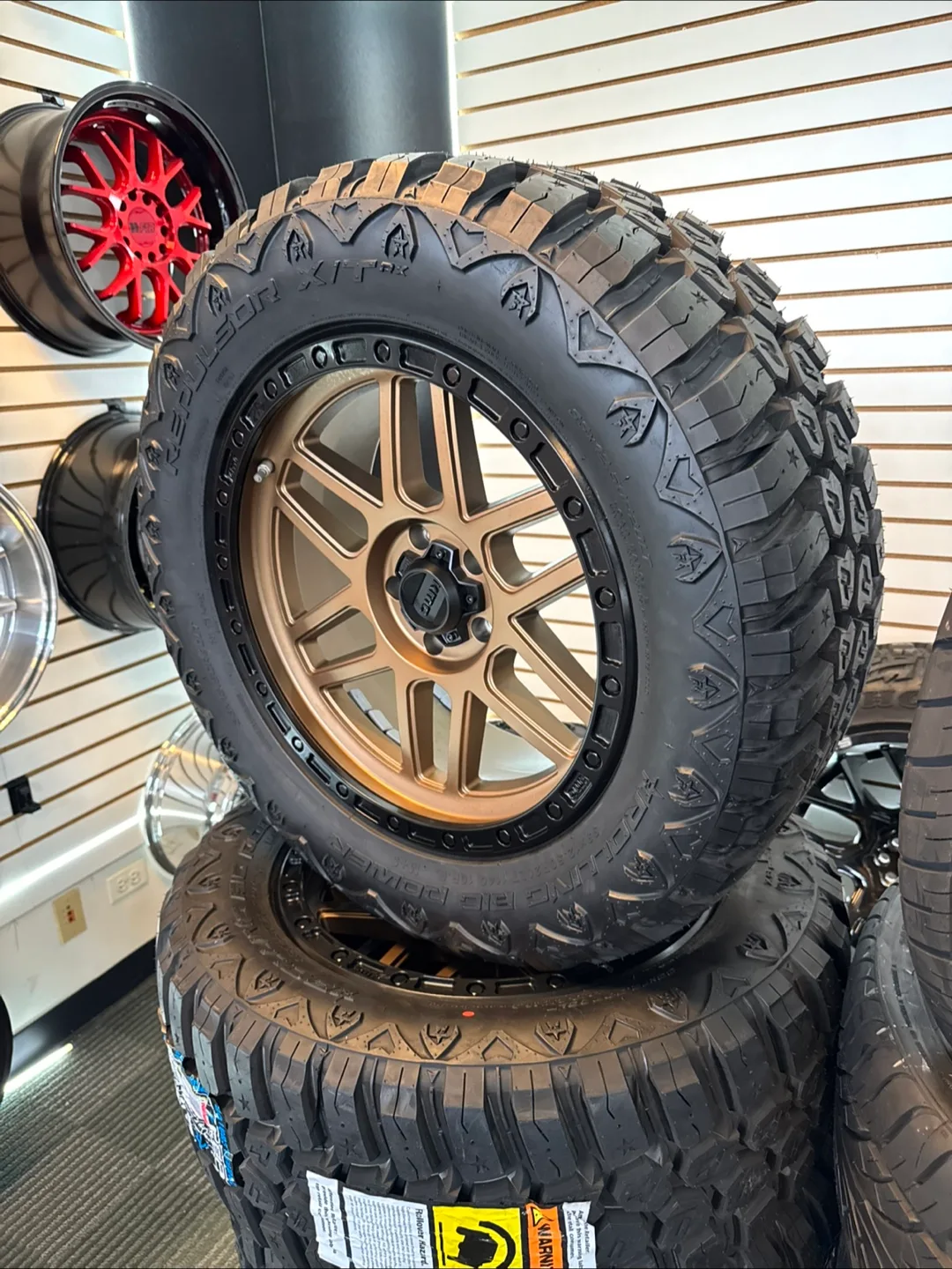 RBP Repulsor M/T RX Tire with kmc 20x10 bronze center satin lip thumbnail