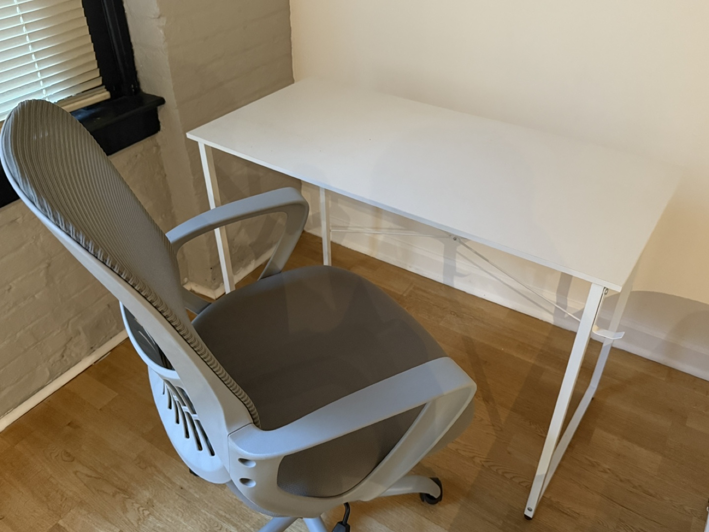 White Desk and Gray Office Chair