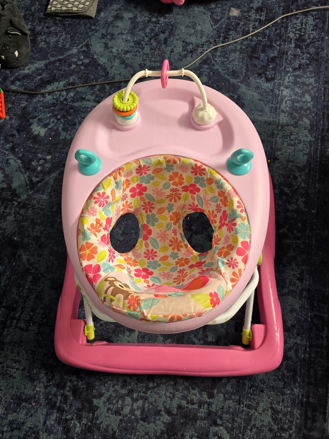 Pink baby walker with wheels