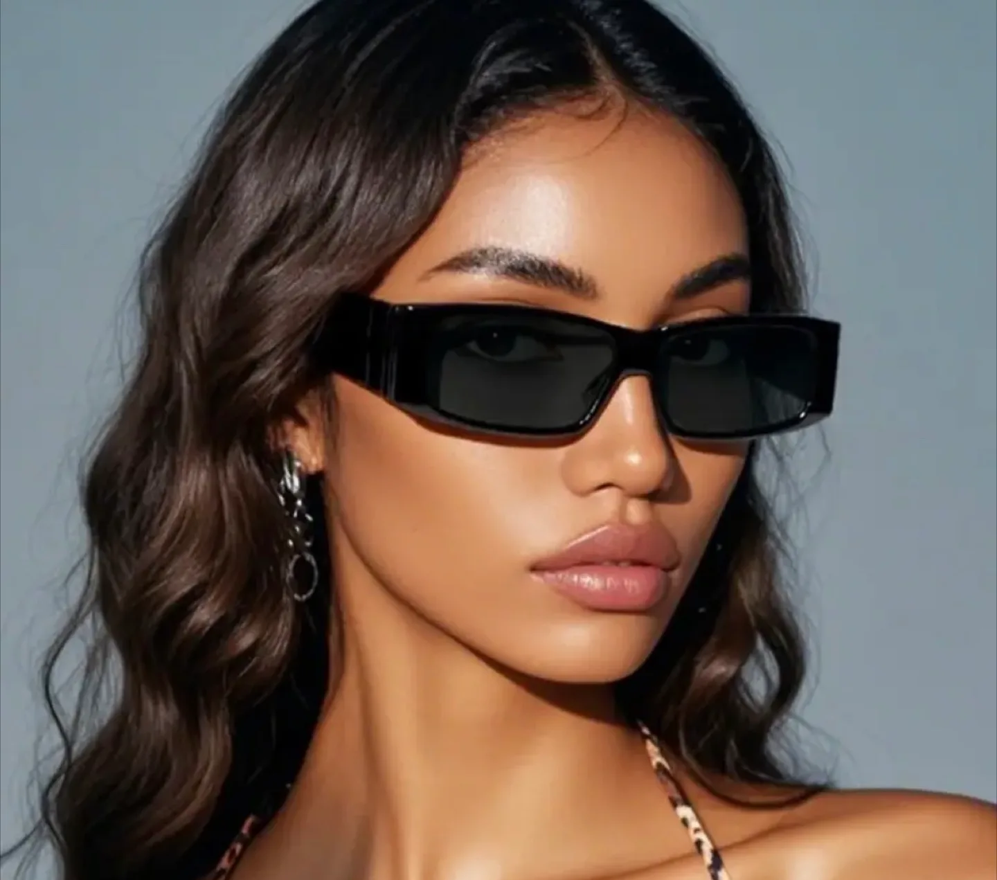 Women’s black sunglasses thumbnail